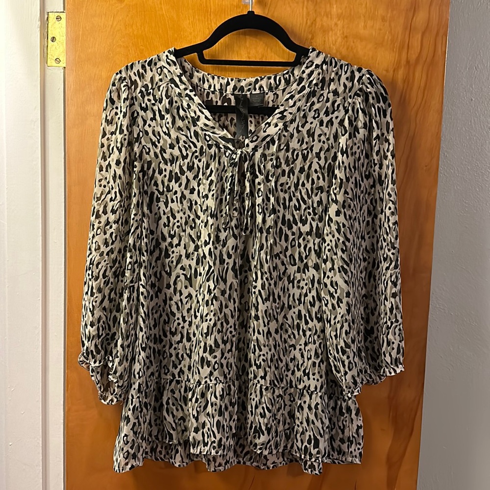 Snow leopard print ruffle top